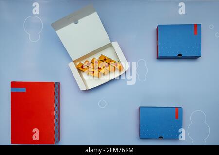fast food boxes, empty clean disposable food containers for a quick snack, laid out food set on a bright background Stock Photo