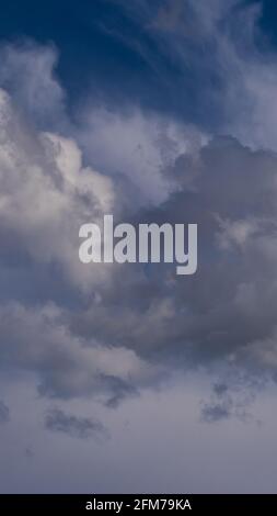 fluffy clouds in a blue sky Stock Photo
