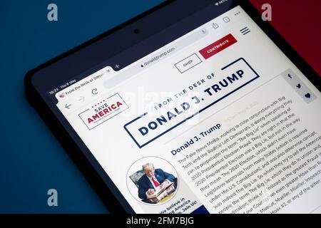 Donald Trump's newly created web site 'From the Desk of Donald J Trump' seen on ipad placed on red and blue background. Concept. Stafford, UK, May 6, Stock Photo