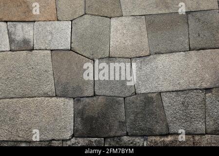 Perfectly constructed stone wall suitable for background use Stock Photo