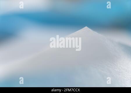 Abstract colored macro background, created with blue paper sheets. Curved lines and shapes and soft color. Stock Photo