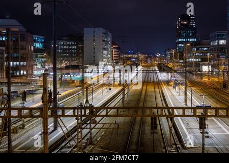 Night view of Zurich Altstetten train station in front of Zurich city Stock Photo