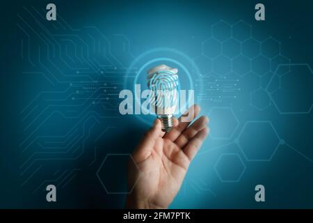 Businessman using fingerprint to access technology against digital Business Safety Internet scan fingerprint id  future of security and password Stock Photo