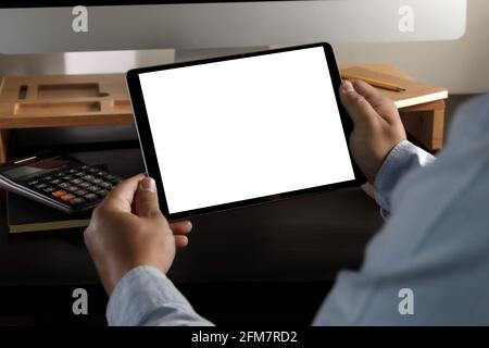 hands holding digital Mock up tablet touch screen device isolated screen and tablet pc with blank white screen Stock Photo