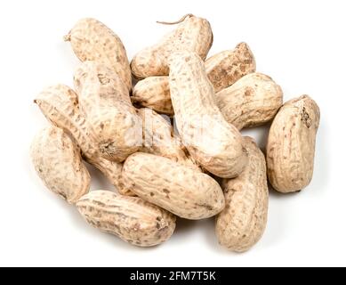 several whole peanuts closeup on white background Stock Photo