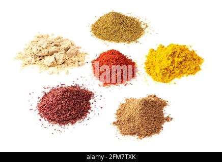 set of various colourful spices cutout on white background Stock Photo