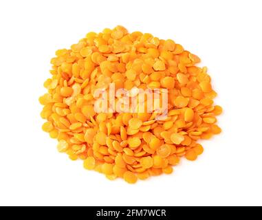 pile of split red lentils closeup on white background Stock Photo