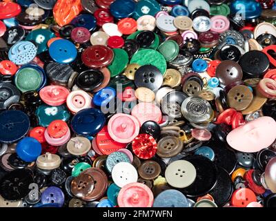 background from many different used buttons closeup Stock Photo