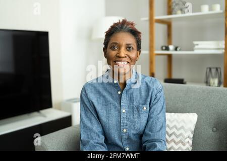Happy Woman Video Conference Webinar Portrait At Home Stock Photo