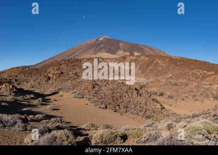 Martian landscape on the eastern slopes of Montana Blanca Mirador las Minas de San Jose with Teide mount at background. Teide National park, Tenerife, Stock Photo