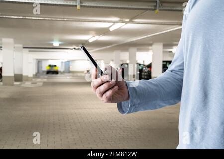 Car Parking Using Phone Internet Technology App Stock Photo
