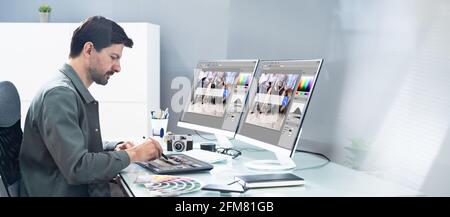 Graphic Photo Designer Using Computer Screen And Tablet Stock Photo