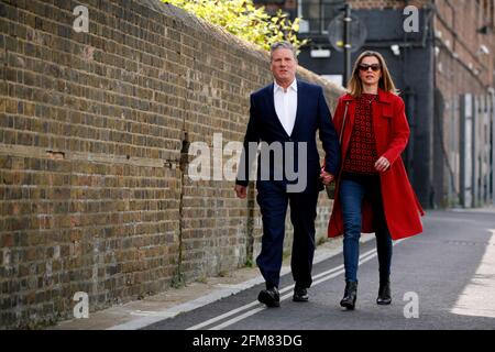 LONDON, May 7, 2021 Britain's Labour Party leader Keir Starmer and his wife Victoria Starmer walk to a polling station to vote in local elections in London, Britain, on May 6, 2021. Millions of voters in Britain are going to polling stations for local elections in what political commentators have dubbed as the Super Thursday, which is seen as a major test for Britain's main political party leaders. Credit: Xinhua/Alamy Live News