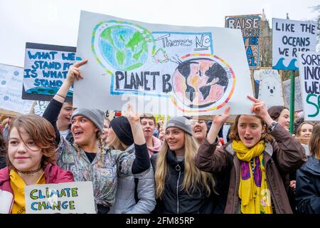 Bristol college student protesters and school children are pictured taking part in a Youth Strike 4 Climate change protest march in Bristol 15-03-19 Stock Photo