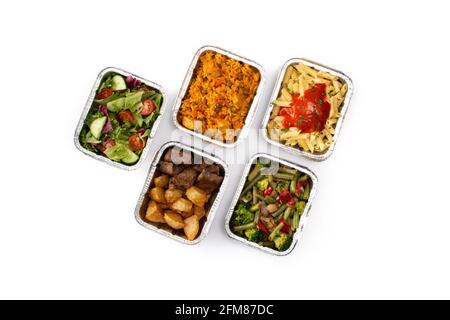 Take away healthy food in foil boxes isolated on white background Stock Photo