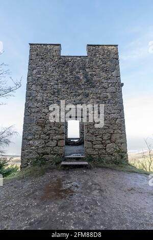 Lady Emily Hesketh's hunting lodge tower ruin near Abergele on the North Wales coast uk in the Gwrych castle woods. Stock Photo
