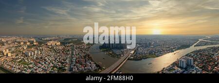 Aerial cityscape photo of Ho Chi Minh city skyline at sunset  Stock Photo