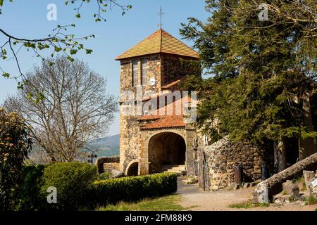 Church Saint Maurice, Usson village, Puy de Dome department, Auvergne-Rhone-Alpes , France Stock Photo