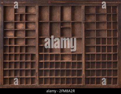 Antique wooden printer tray. Perfect for inserting isolated objects. Stock Photo