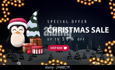 Special offer, Christmas sale, up to 30 off, beautiful discount banner with night winter landscape, silhouette city on horizontal and penguin in Santa Stock Photo