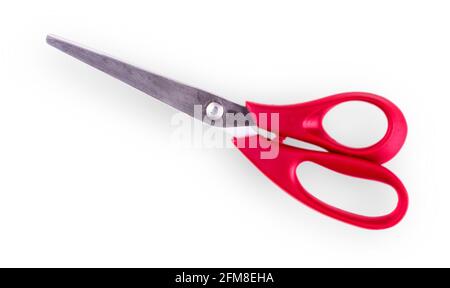 new red paper scissors on a white background Stock Photo