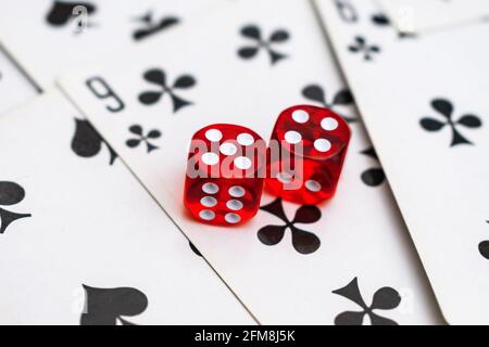Dice on cards in a casino with a drawn nine Stock Photo