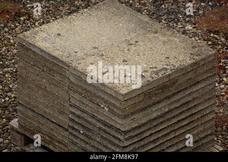 stacked Building cement plates at the construction site on wooden palett Stock Photo
