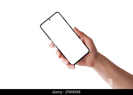 Isolated phone in woman hand. Modern smart phone with isolated screen for mockup. Softly retouched hand shows a smart phone Stock Photo