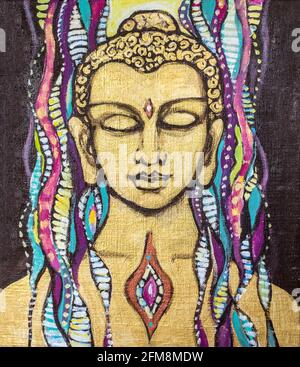 Golden buddha with colored elements on a dark background. Sacred streaming painting. Acrylic on canvas. Stock Photo