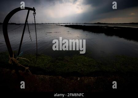 silhouette,crane,boat,hoist,dinghy,boating,boats,estauary,Nature Reserve,National Trust,Newtown,Isle of Wight,England,UK, Stock Photo