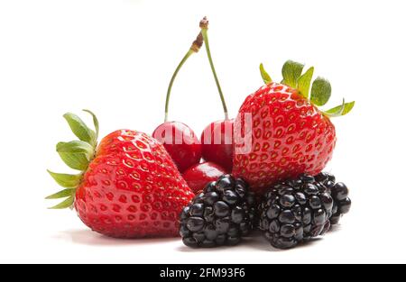 Closeup of assorted fresh berries isolated on white background Stock Photo
