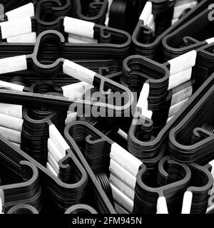 Stacking of plastic hangers background Stock Photo