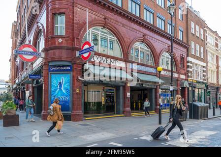 People out and about around Covent Garden underground station. London, England, UK Stock Photo