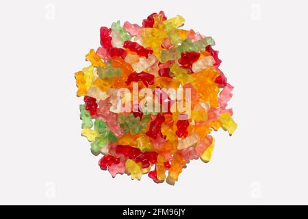 sweet candy gummy bears pile group assorted colors on a white background Stock Photo
