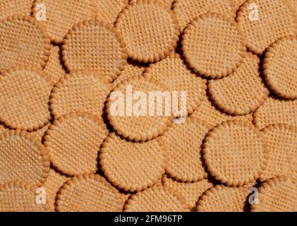 bunch of sugar coated hortbread cookie snacks treats arranged round cookies Stock Photo