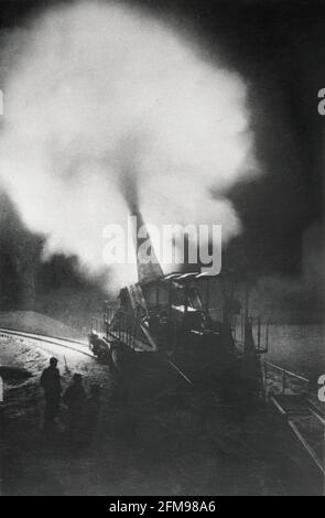 World War I French  Artillery Railway Gun Firing Ammunition WWI circa 1917 rail gun smoke blast Stock Photo