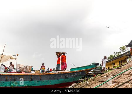 Local fishermen uploading fish for selling in the fish market, I captured this image from Chandpur, Bangladesh, Asia Stock Photo