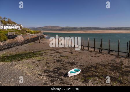 Small boat on sand at Aberdyfi on the welsh coast Stock Photo