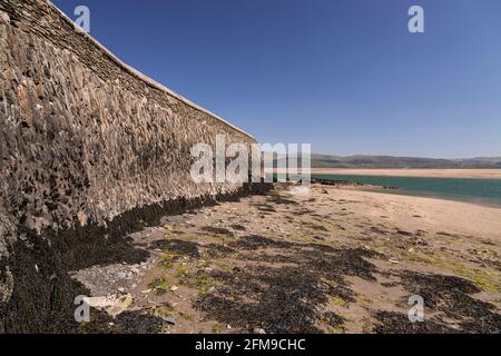 Seawall at Aberdyfi on the welsh coast Stock Photo