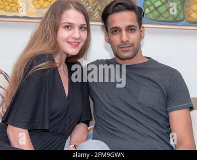 Cute international couple - a handsome Indian man with an attractive Russian woman Stock Photo