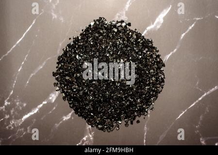 Modern industry depends on mining for the valuable rare-earth, rare earth crystal detail Stock Photo