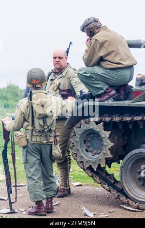 World War Two reenactment. Blyth, Northumberland, England. 19.05.2013. WW2 enthusiasts with American Sherman Tank at WW2 reenactment. Stock Photo