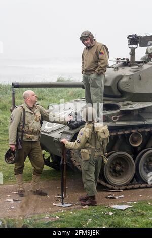 World War Two reenactment. Blyth, Northumberland, England. 19.05.2013. WW2 enthusiasts with American Sherman Tank at WW2 reenactment. Stock Photo