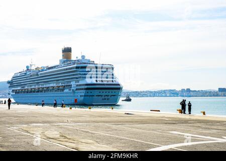 Cruise passengers ship berthing in the port services to the passenger sailing to destination port, restriction quarantine healthcare to all berthing p Stock Photo