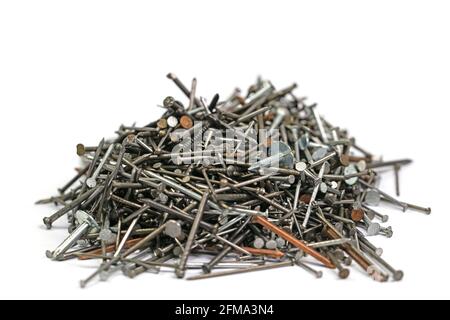 Many different nails against a white background Stock Photo