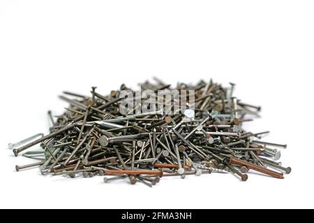 Many different nails against a white background Stock Photo
