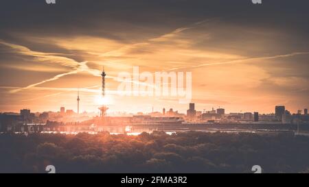 View over the Berlin Grunewald with radio and television tower at sunrise. Stock Photo