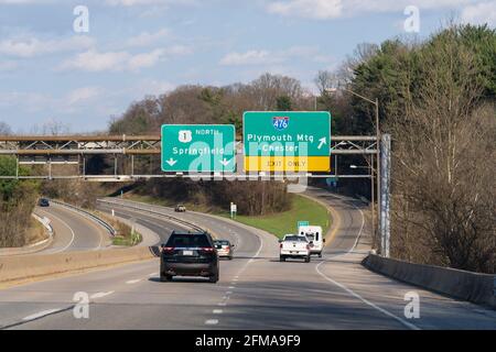 Media, PA - April 4, 2021: Exit signs for Route 476 Plymouth Meeting and Chester from Route 1 in Pennsylvania headed toward Springfield. Route 1 is al Stock Photo