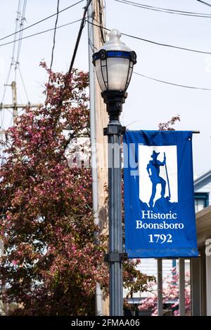 Boonsboro, MD - April 20, 2021: Historic Boonsboro 1792 banner is on a lamp post. Boonsboro was founded by brothers George and William Boone, cousins Stock Photo