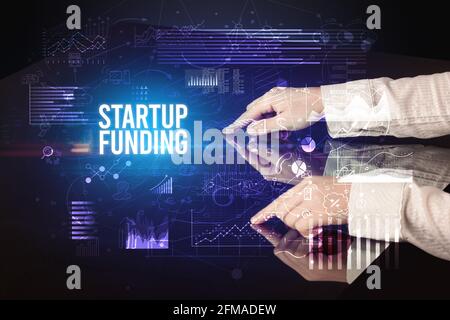 Businessman touching huge screen concept Stock Photo